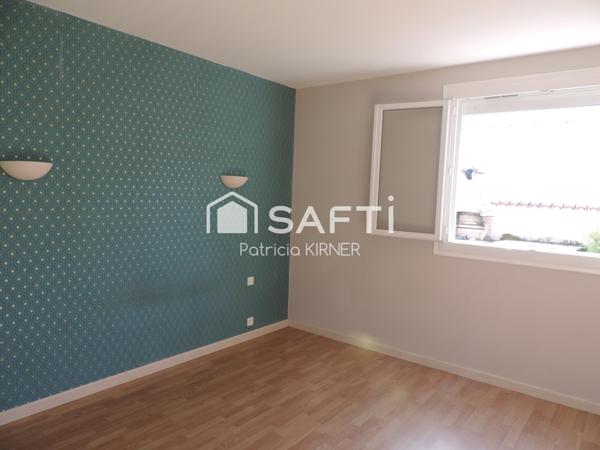 Maison plain pied T5 avec garage et jardin.