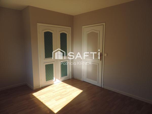 Maison plain pied T5 avec garage et jardin.