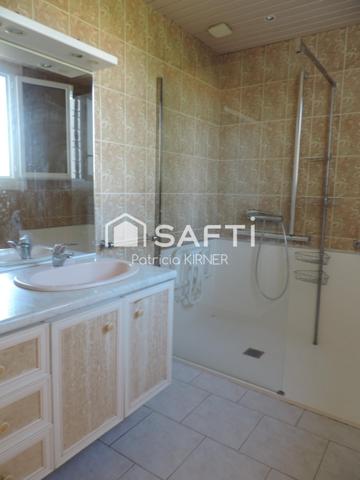 Maison plain pied T5 avec garage et jardin.