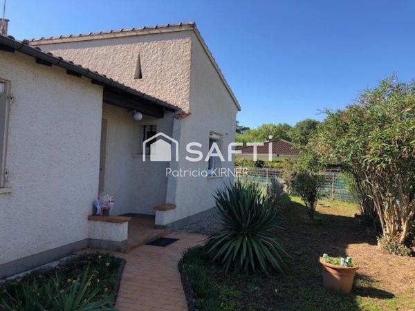 Maison plain pied T5 avec garage et jardin.