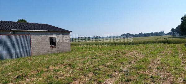 Terrain avec bâti en parpaings