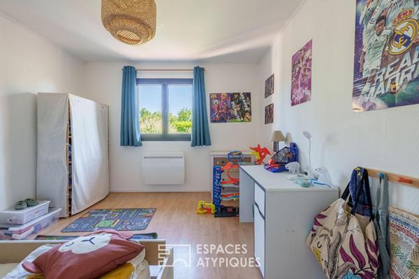 Maison rénovée et son jardin paysager