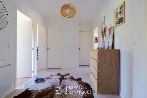 Maison rénovée et son jardin paysager