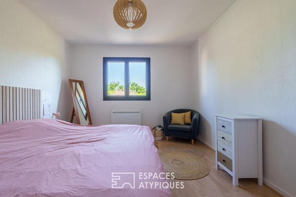 Maison rénovée et son jardin paysager