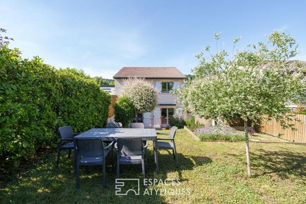 Maison rénovée et son jardin paysager