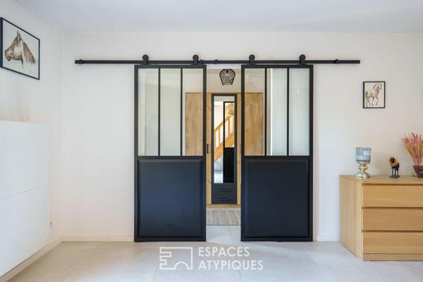Maison rénovée et son jardin paysager