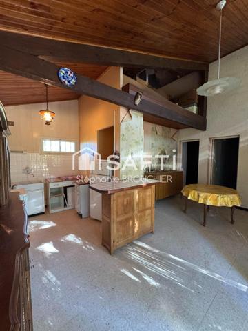 Maison avec garage et jardin proche village