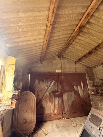 Maison en pierre, 65m², 2 chambres avec garage et dépendance, 29 500 €