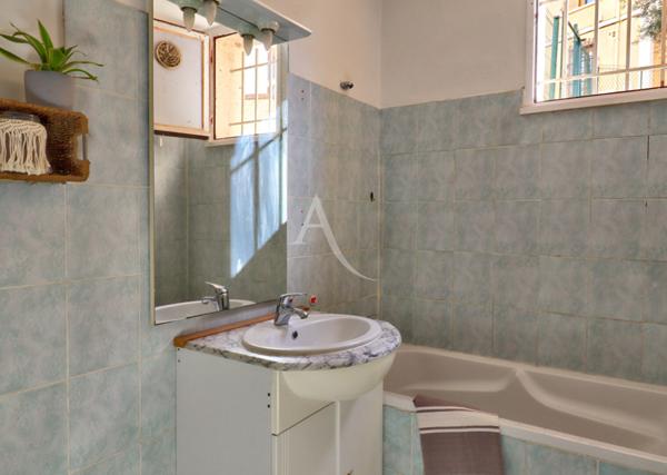 APPARTEMENT AVEC BALCON CAVE ET ASCENSEUR PROCHE CENTRE VILLE