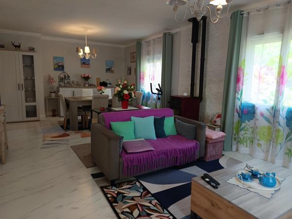 MAISON DE PLAIN-PIED AVEC GARAGE A DEUX PAS DES COMMODITES