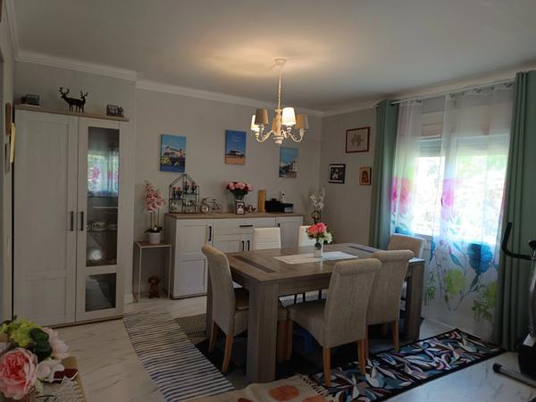 MAISON DE PLAIN-PIED AVEC GARAGE A DEUX PAS DES COMMODITES