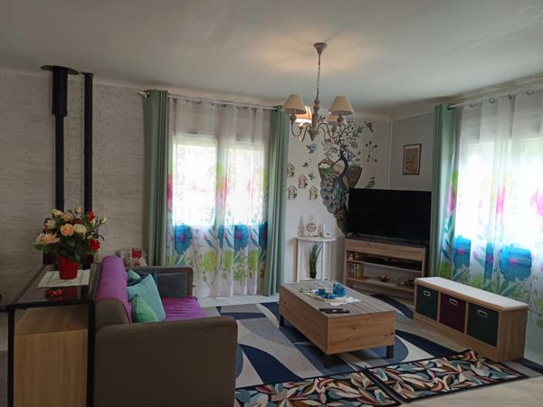 MAISON DE PLAIN-PIED AVEC GARAGE A DEUX PAS DES COMMODITES