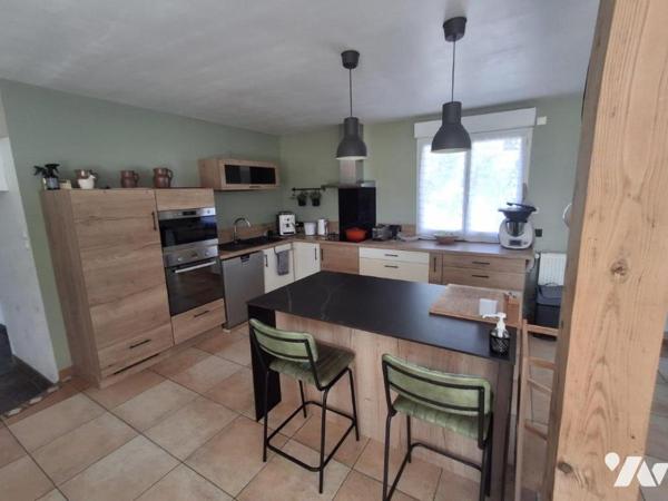 Maison familiale de 180 m² avec 4 chambres et beau jardin à Malville