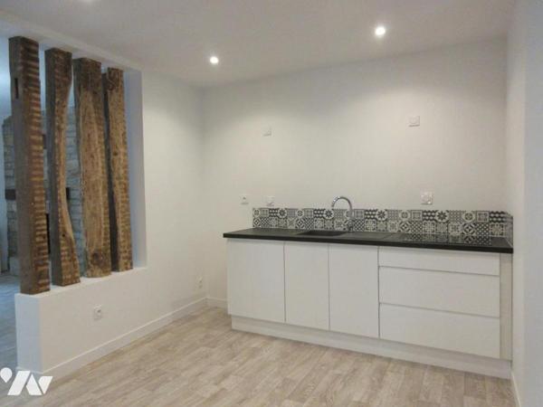 IMMEUBLE :  APT T4+ COMMERCE