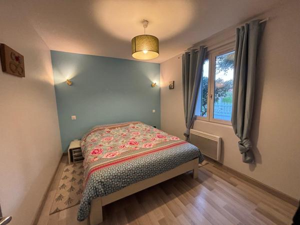 Maison plain pied de 94m2 sur parcelle arborée de 533m2.