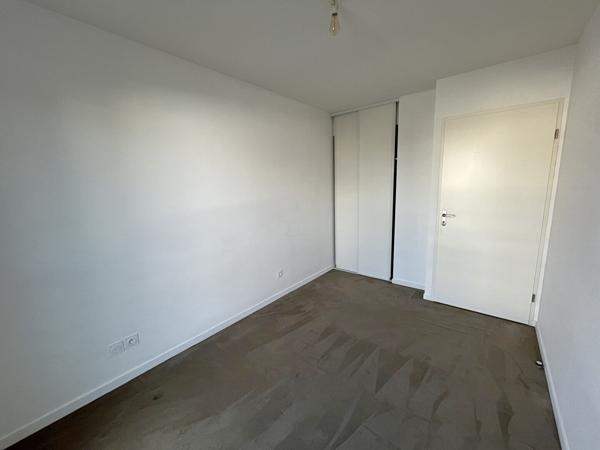 SAINT HERBLAIN bourg  appartement 2 chambres, terrasse plein sud, parking en sous-sol sécurisé