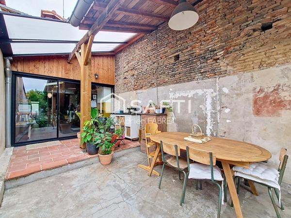 Un écrin de verdure dans une maison de village au centre de Bessières.