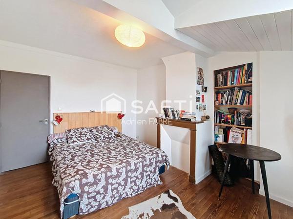 Un écrin de verdure dans une maison de village au centre de Bessières.