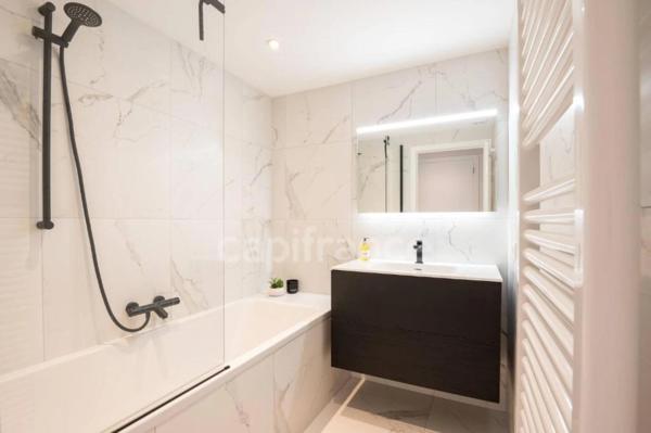 Appartement T4 Duplex - 76m² - 1 garage - 2 places de sationnements - 1 cave