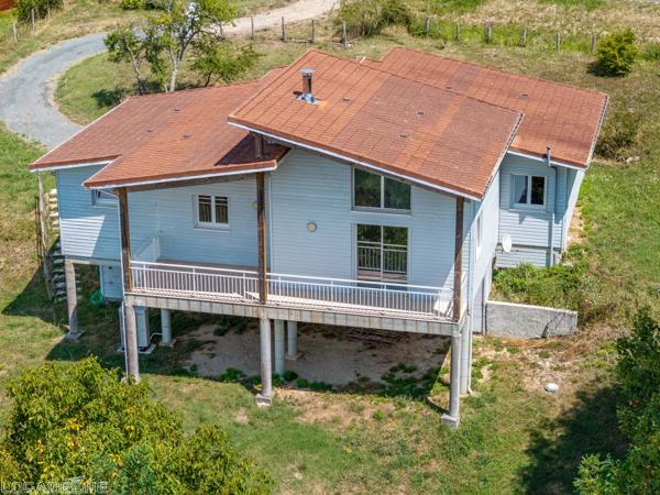 Maison contemporaine en ossature bois avec vue dominante