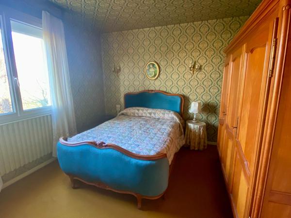 Maison de ville avec garage et jardin attenant