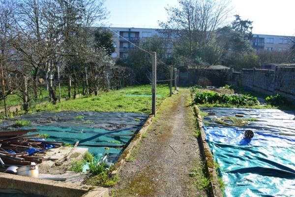 Vente sur la commune de Sablé sur Sarthe une maison d'habitation avec garage et jardin
