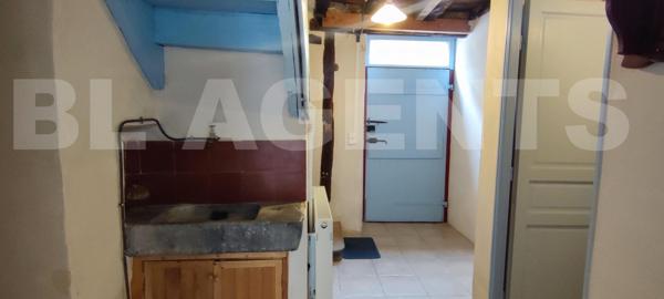 Maison de village avec garage à etage et petit exterieur