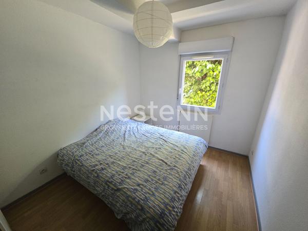 Appartement Toulouse T4 87.17 m2 avec jardin privatif et 2 places de parking au pied du tramway