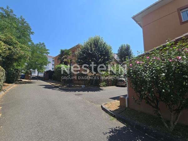 Appartement Toulouse T4 87.17 m2 avec jardin privatif et 2 places de parking au pied du tramway