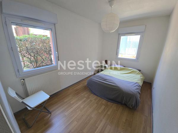 Appartement Toulouse T4 87.17 m2 avec jardin privatif et 2 places de parking au pied du tramway