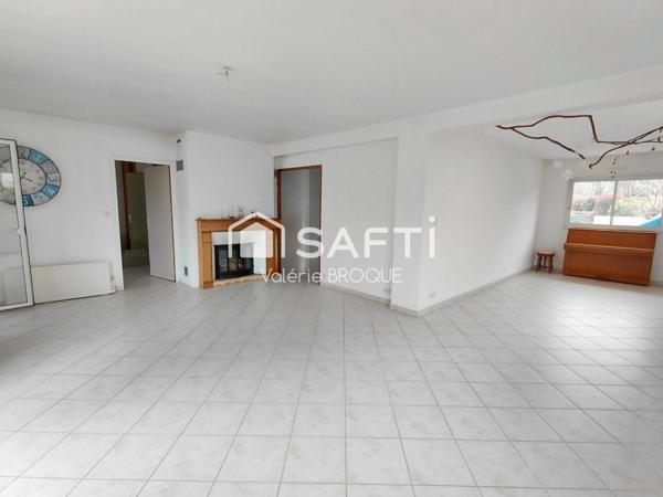 Maison non mitoyenne, vie de plain pied, grand terrain et grand garage