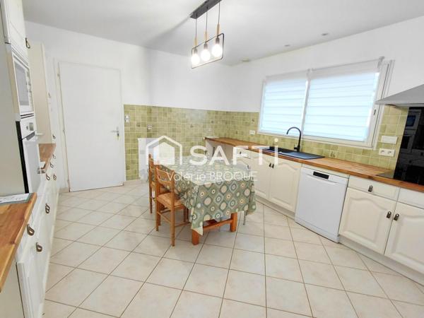 Maison non mitoyenne, vie de plain pied, grand terrain et grand garage