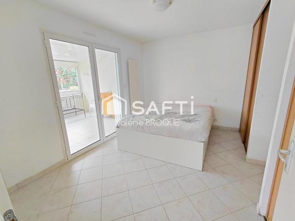 Maison non mitoyenne, vie de plain pied, grand terrain et grand garage