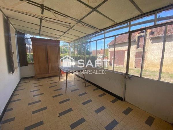 Maison de village avec grange et jardins