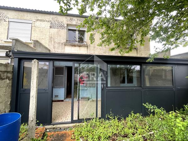 Maison à vendre à Bohain-en-Vermandois - 4 chambres, garage et jardin