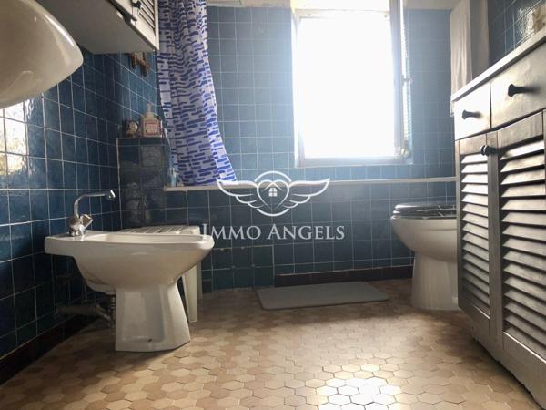 Maison de village 130 m² à moderniser – 3 niveaux avec terrasse, garage et cave – Taulignan