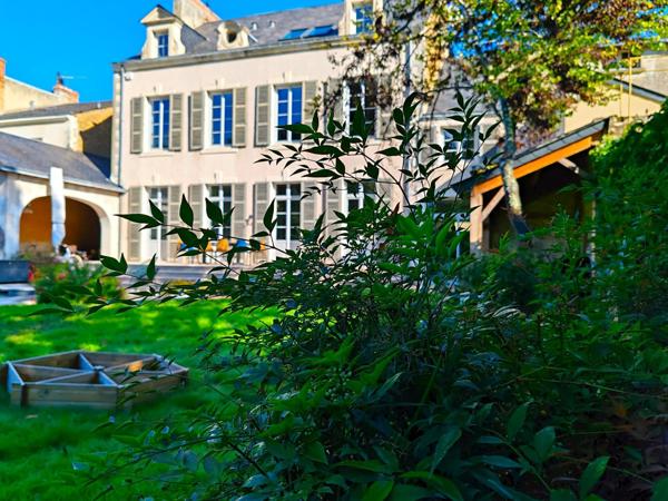 Demeure Haussmannienne et son parc paysager, en coeur de ville