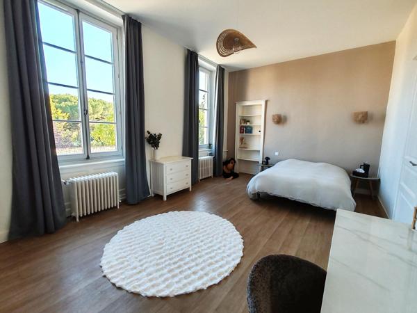 Demeure Haussmannienne et son parc paysager, en coeur de ville