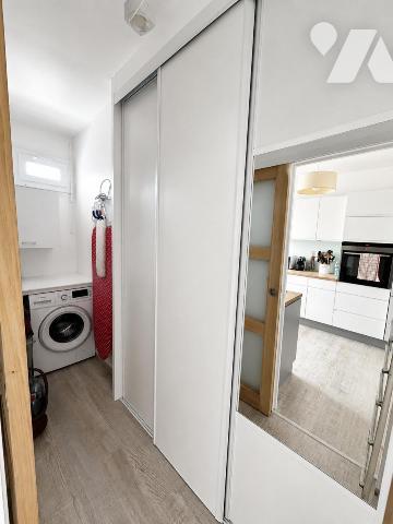 Appartement 3 pièces de 75 m² avec balcon, deux parkings, cave dans une résidence sécurisée