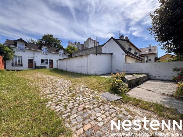 Maison divisée en deux appartements (103 m²) Quartier TREMBLAY