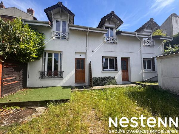 Maison divisée en deux appartements (103 m²) Quartier TREMBLAY