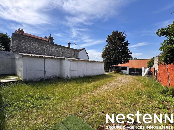 Maison divisée en deux appartements (103 m²) Quartier TREMBLAY