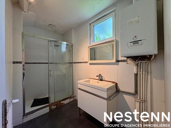 Maison divisée en deux appartements (103 m²) Quartier TREMBLAY