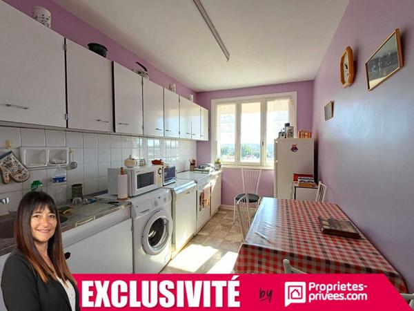 Roanne centre T5 avec balcon, vue dégagée et stationnement