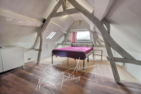 Maison en centre ville avec jardin, terrasse et places de parkings privatives