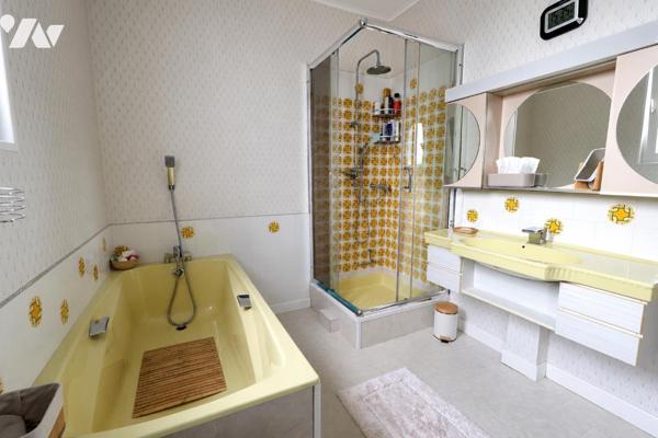 Dans un environnement privilégié, charmante maison individuelle – 3 chambres – garage – terrain clos
