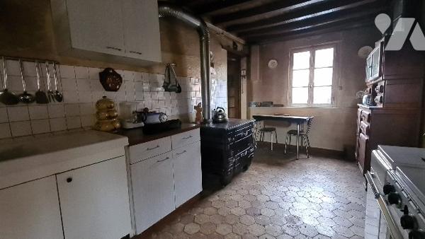 Maison 2 ch, grand jardin bord de route