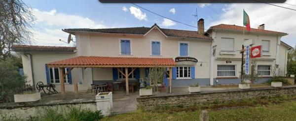 Espace commercial + 2 appartements