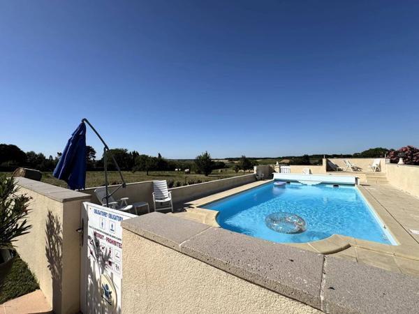 Propriété comprenant une maison principale d'habitation et 3 gites indépendants