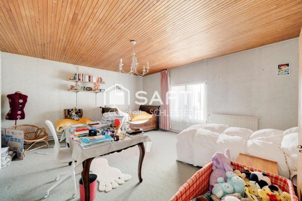 Maison Lorraine de 330 m2 pleine de charme avec une partie sur l'arrière pouvant servir à créer un appartement ou son activité professionnelle